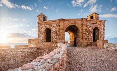Historic city walls surrounding a Moroccan medina