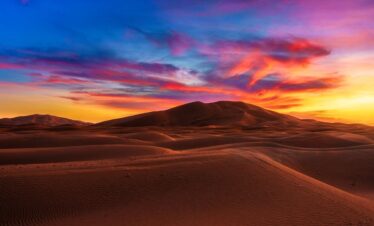 Sunset over the sand dunes of Merzouga, Sahara Desert, Morocco