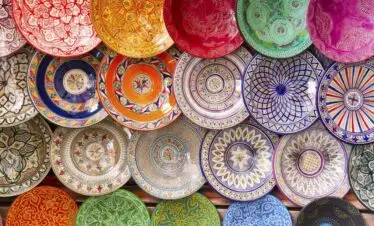 Traditional Moroccan pottery displayed in an artisan workshop